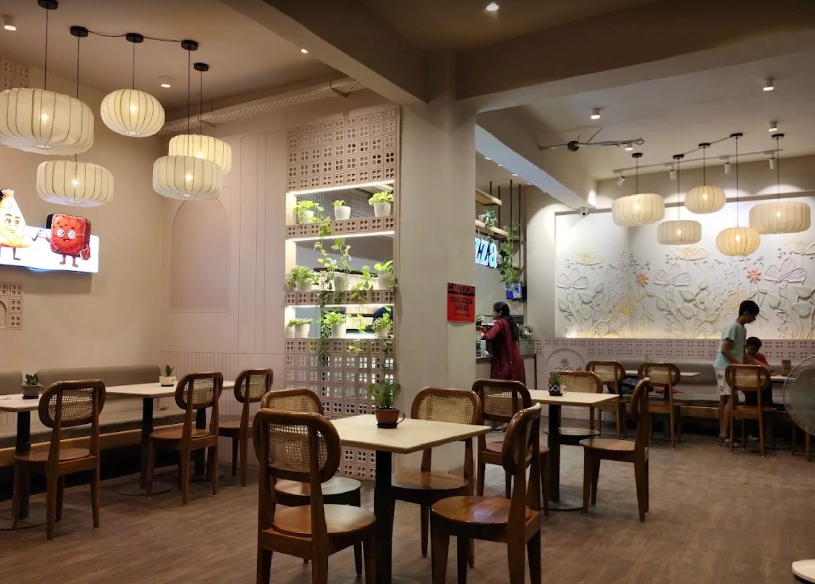 Dining area and lanterns at Cafe Dolcezza in Bhopal